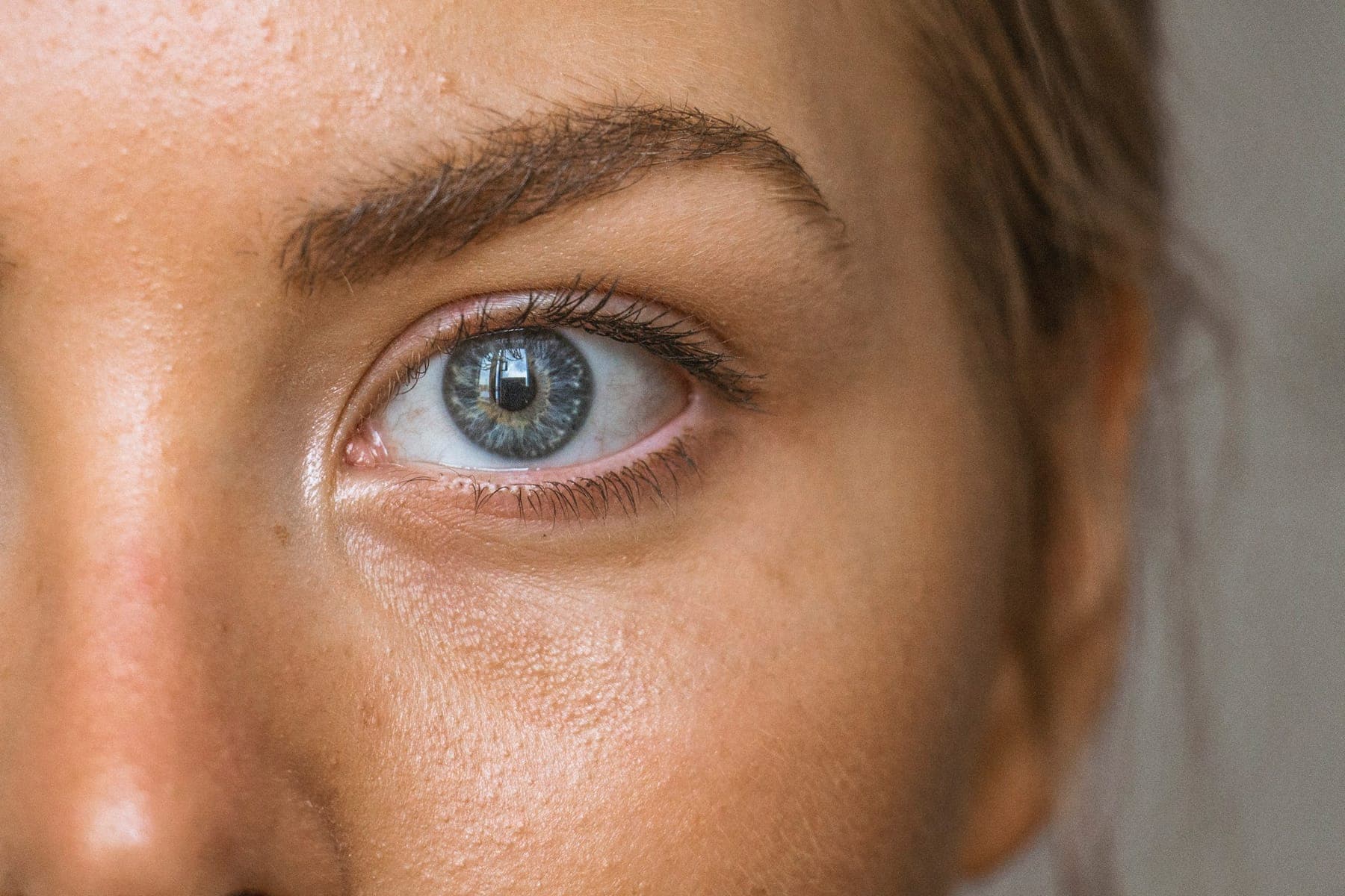 Close-up of a woman's eye in soft natural light